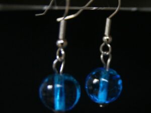 boucle oreille en verre de murano coloris turquoise transparent