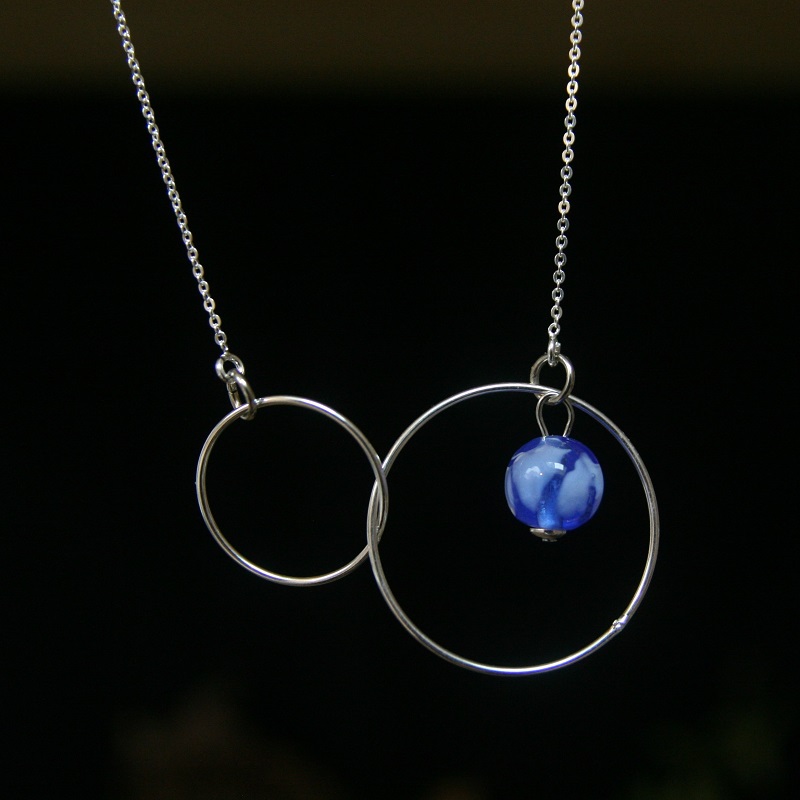 collier double anneau perle bleu clair transparent