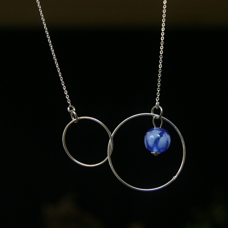 collier double anneau perle bleu transparent