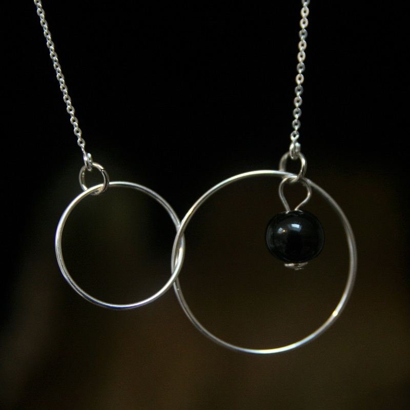 collier double anneau perle noire