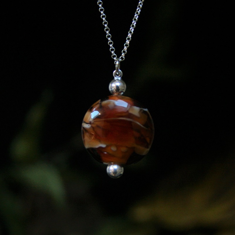 pendentif ambre marron transparent
